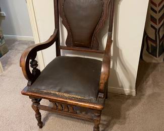 antique leather arm chair