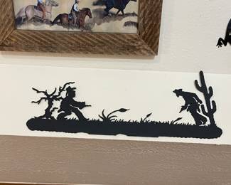 Metal cowboy art