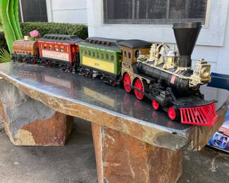 basalt table and Jim Beam decanter train (bottles mostly full)