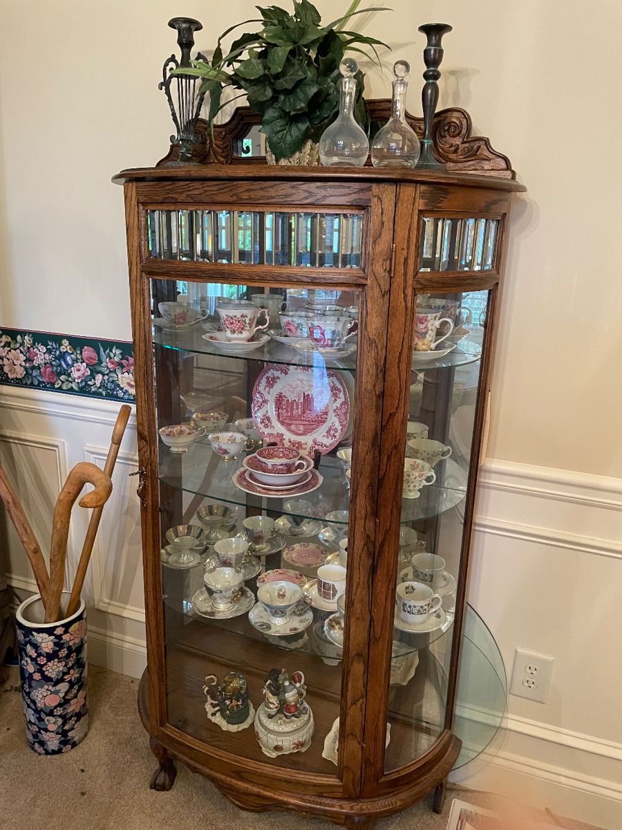 China Cabinet full of great china tea cups and saucers