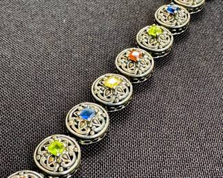 $120 - round disk set with multi color stones - 7 inches 925 on clasp