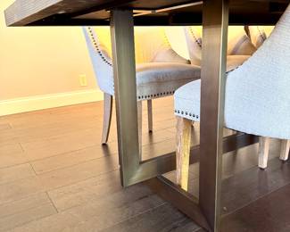 $1100 - Trestle distressed wood with metal base - 38x108; $200 (each) - upholstered nail head dining chair (10 available) - 20x24x35. All in perfect condition.