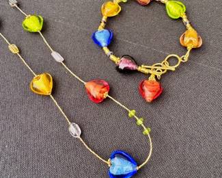 Shop fine jewelry in person or call to inquire! Murano glass Venetian bead necklace with matching bracelet.