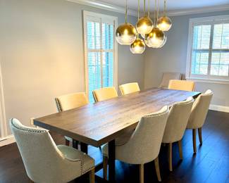 $1100 - Trestle distressed wood with metal base - 38x108; $200 (each) - upholstered nail head dining chair (10 available) - 20x24x35. All in perfect condition.