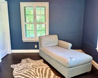 $550 - Upholstered Chaise lounge by Restoration Hardware- 71x33x32. Normal wear noted; $48 - zebra matted shag rug, polyester.