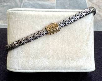 Shop fine jewelry in person or call to inquire! John Hardy yellow/silver metal bracelet.