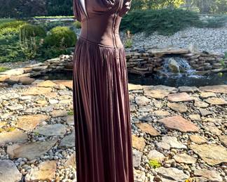 STAFF FAVORITE! Back image of the Zimmermann chocolate column dress.