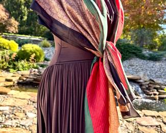 $30 - Pashmina in the style of Coach. Tag reads "100% silk feeling polyester."