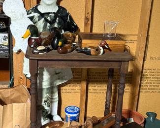 1940's style table, covered with wooden hand painted ducks, and a vintage leather topped Aries box! 