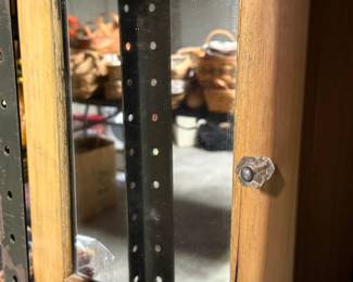 Cute medicine cabinet with real glass door pull..