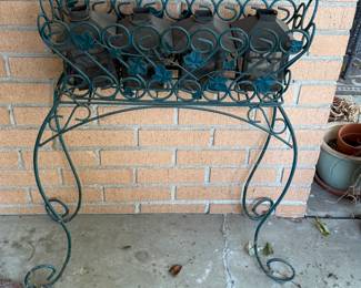Raised wrought iron planter 