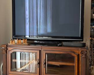 2009 Television on a large entertainment center that looks brand new! 