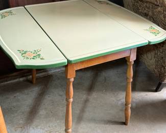 Porcelain top table with hinged leaves...