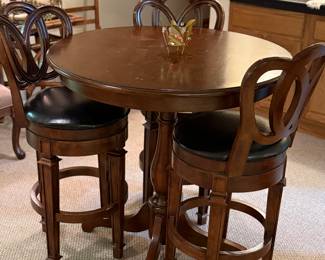 Counter height pub table plus 3 swivel stools, let the debauchery begin! 