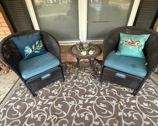 Cute pair of faux wicker chairs with cushions...