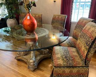 One of the most beautiful and unusual dining room tables I have presented all year! I LOVE this piece! Koi base is solid wood with gilded gold finish, the top is glass and it is perfect.
