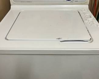 GE Washer works great...it does have some cosmetic damage to the top right side, but it does not affect the way it operates.