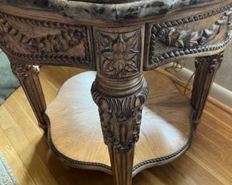 This is the rounder Schnadig side table...same marble inset surround, glass top and bottom shelf...classic elegance!