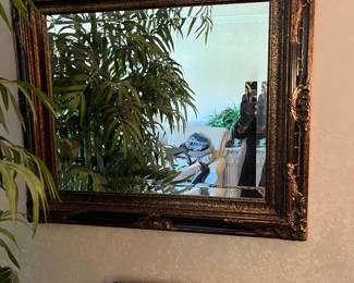 Beautiful mirror for any room...lovely black with gold accents.