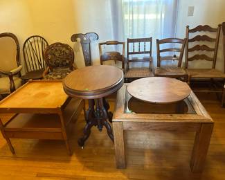 Oak coffee table with beveled glass insert. Turn table on top of it. Walnut parlor table. Maple coffee with drawer. Miscellaneous chairs, all in good condition.