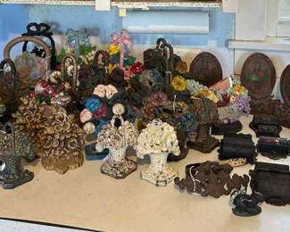 Cast Iron Doorstops: floral,  flower baskets. Wall hanging match holders. Curtain tiebacks.
