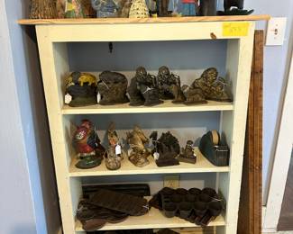 Figural Cast Iron. Lions; Parrots; Fish; Camel; Grundsow Lodsch 13 with squirrel; heavy tape dispenser; corn bread pans; popover pan; Turqs head muffin pans; Abelskiver pans.