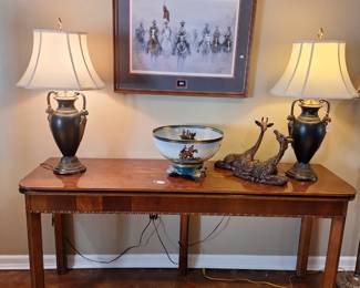 Henredon console table that opens to a dining table
Pair of lamps