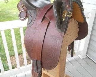 2 Australian saddle with detailed leather and gold trim
