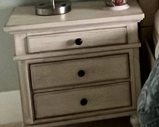 Item # 48.  Ashley Queen bedroom suite.  Antique white Queen panel bed, 2 night stands, and dresser. See following pictures for nightstands and dresser.  Great Condition.                Price -$350.00