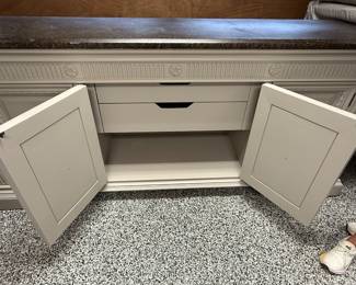 Item #26.  Greige sideboard with faux marble top.  Top has scratches.  See next pictures for condition.                   W- 84".  D- 21". H- 38 1/2". Price - $130.00