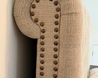 Item #36.  King/California King Tufted  sleigh bed from Ashley Furniture.  See next picture for small stain.    Headboard height- 67in.   Footboard height  -31in.       Price -$200.00.