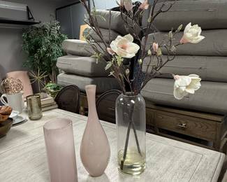 Item #55. Clear vase with faux flowers and 2 pink vases. Clear vase with flowers- H -40in.  Tall pink vase- 18in. Small pink vase- 12in.                                                                     Price - $20.00