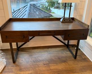 Item #3 - Ashley Furniture Desk 1. Middle drawer shows light sings of wear. L- 63"  D- 28" H- 33 1/4.                     Price $125.00