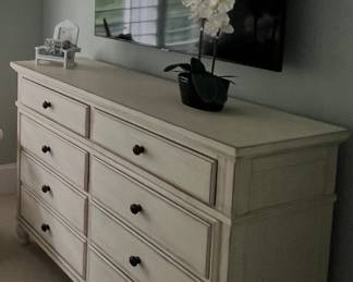 Item # 48.  Ashley Queen bedroom suite.  Antique white Queen panel bed, 2 night stands, and dresser.  See following pictures for nightstands and dresser.  Great Condition.                Price -$350.00