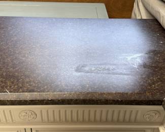 Item #26.  Greige sideboard with faux marble top.  Top has scratches.  See next pictures for condition.                   W- 84".  D- 21". H- 38 1/2". Price - $130.00