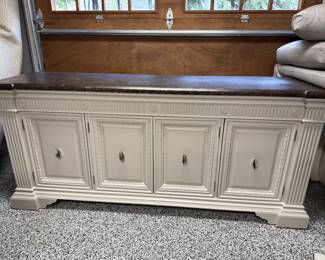 Item #26.  Greige sideboard with faux marble top.  Top has scratches.  See next pictures for condition.                   W- 84".  D- 21". H- 38 1/2". Price - $130.00