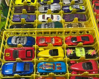 Collection of over 75 hot wheels and matchbox toy cars.