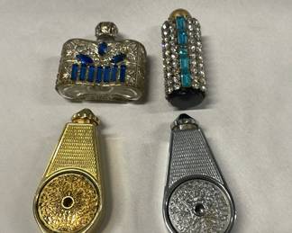 Perfume bottles and atomizers. Very mid-century modern.