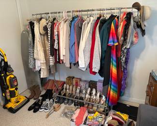 Size large women’s shirts, sweaters, coats, skirts. Size 10 shoes. Several dress shoes worn 1 time at weddings.