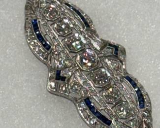 Massive Art Deco brooch/pendant in platinum with 3.8 carats of flawless diamonds and natural sapphires