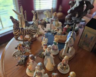 Multiple figurines by multiple skilled artisans