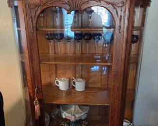 Handmade Amish Serpentine Cloud glass is made of tiger oak with original hardware and lock assemblies intact.