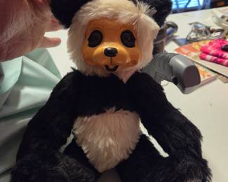 One of multiple vintage antique stuffed animals