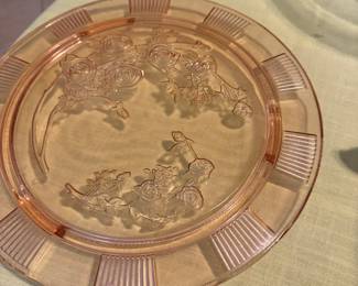 Pink depression glass platters and cake plates