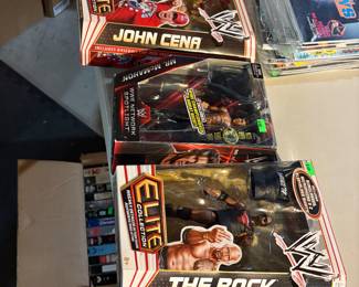 John Cena, The Rock and Mr. McMahon action figures