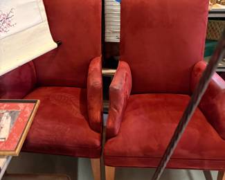 Red suede armchairs