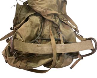 Early backpack on metal frame