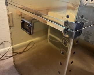 Have two of these Hollywood regency trunks. Spectacular! Apologies for poor photo, they are reflective so its  hard to get a photo.