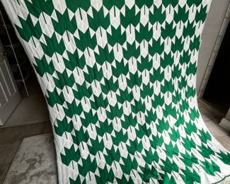 #196	quilt	leaf quilt top has binding no batting or backing 76x84	 $40.00 			
