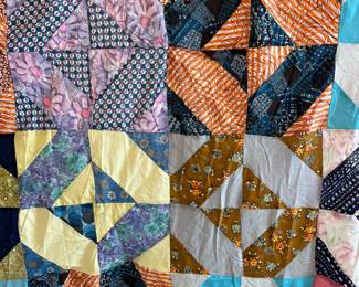 #199	quilt	Scrappy flying geese on point quilt top 86x80	 $35.00 			
